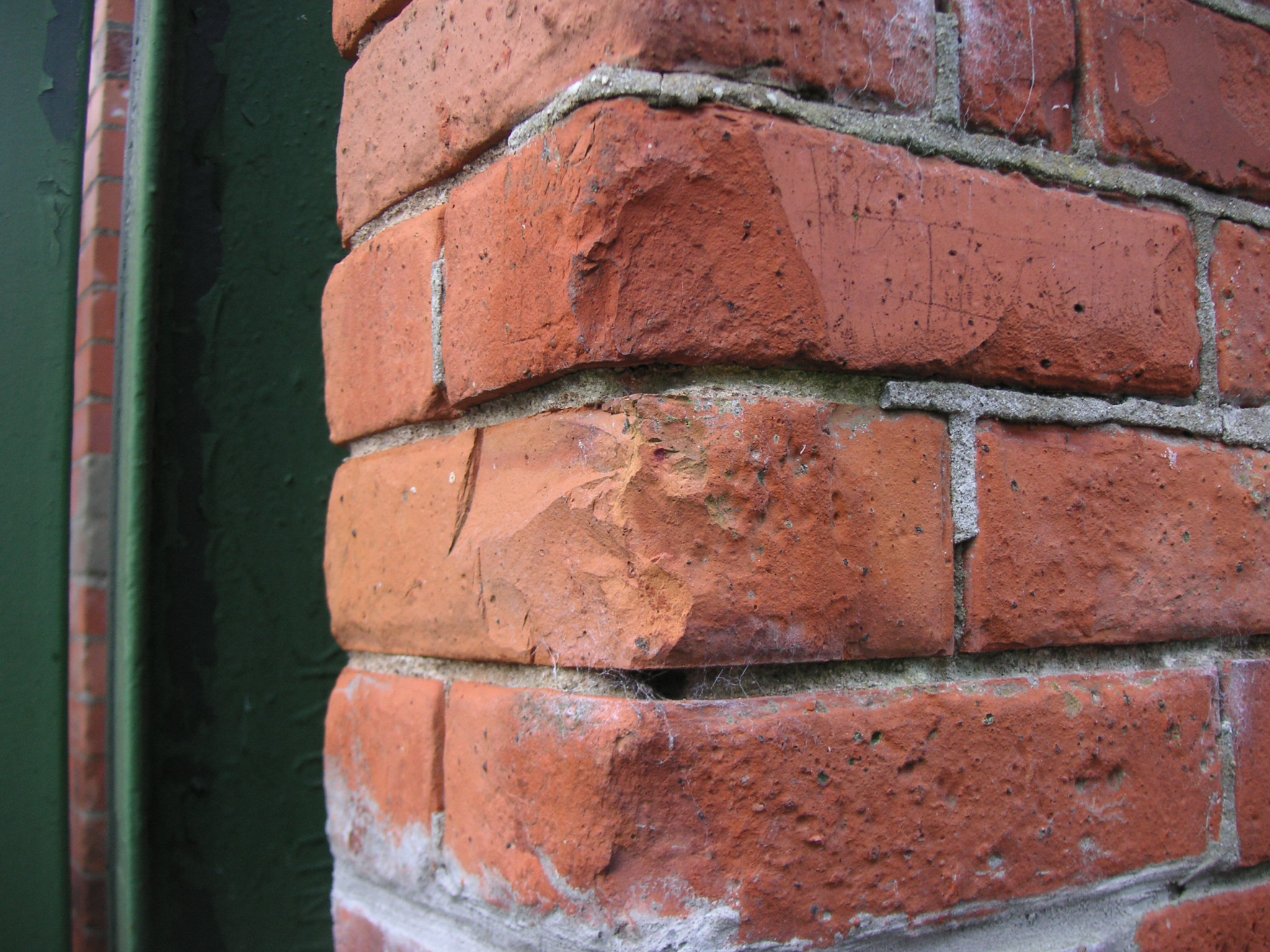 Improper cement pointing in brickwork, Wexford town Post Office